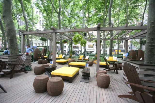 To promote their new service in and out of LaGuardia Airport (beginning June 28th), Southwest Airlines has enlisted celebrity chef Tom Colicchio to open a new al fresco lounge in the southwest corner of Bryant Park. The Porch (designed by Nancy Thiel Architecture + Design) comes complete with wicker swings, rocking chairs and Adirondack chairs, and power outlets for those who wish to take advantage of Bryant Park's free Wi-Fi. The porch is open to the general public, not just paying customers, though it's a safe bet that if you sit down long enough you'll eventually succumb to a pint of specially brewed Southwest Summer Ale, one of the local brews, or something off the summer cocktail menu. Colicchio's small-plates menu includes items like a New York Meatball Sandwich, Southwestern Pork Sandwich and Baltimore Crab Sandwich. The Porch is open in Bryant Park Mondays through Thursdays from 5 p.m. to 9 p.m., and Fridays from 12 p.m. - 4 p.m. 